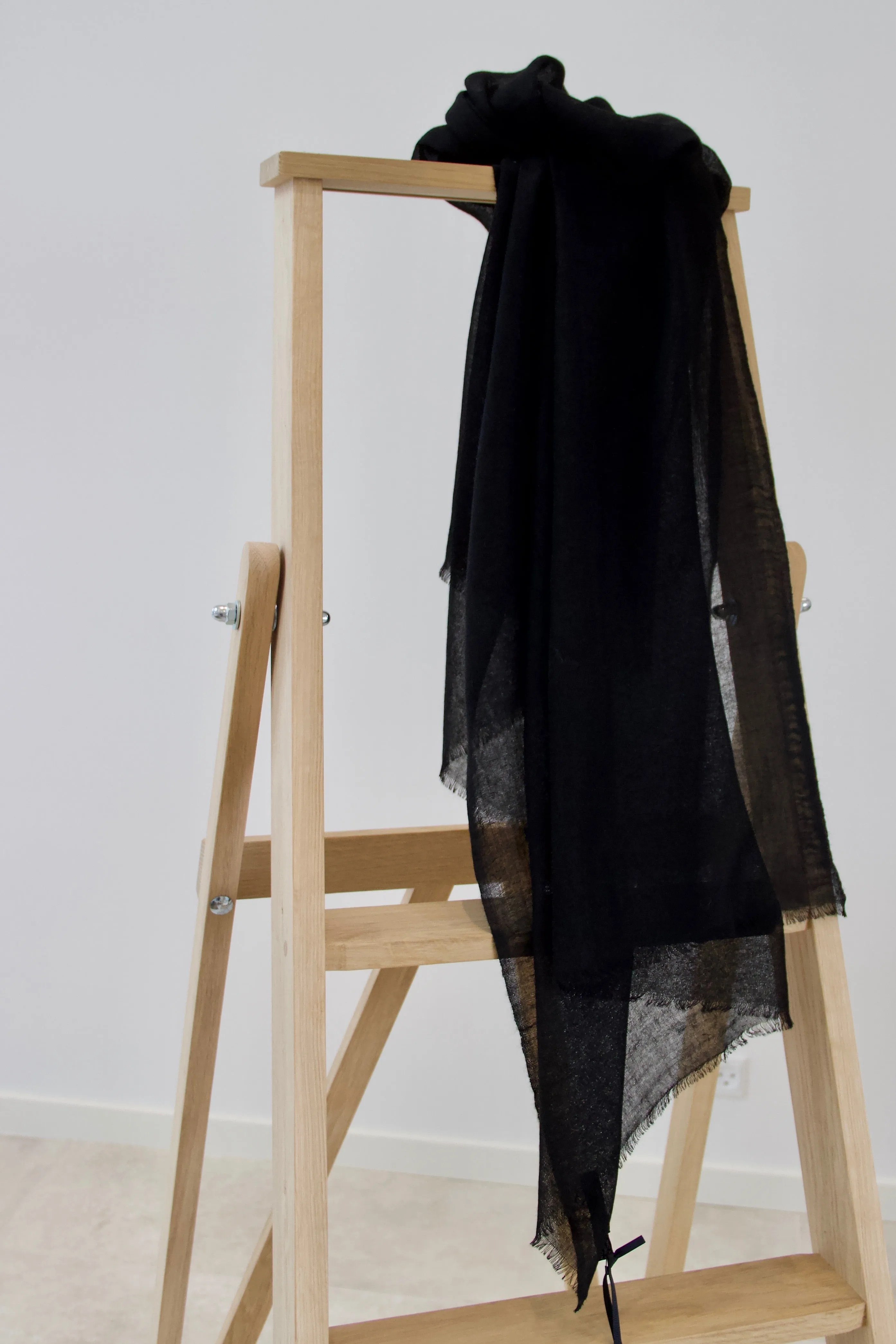 Black wool scarf in pure new wool